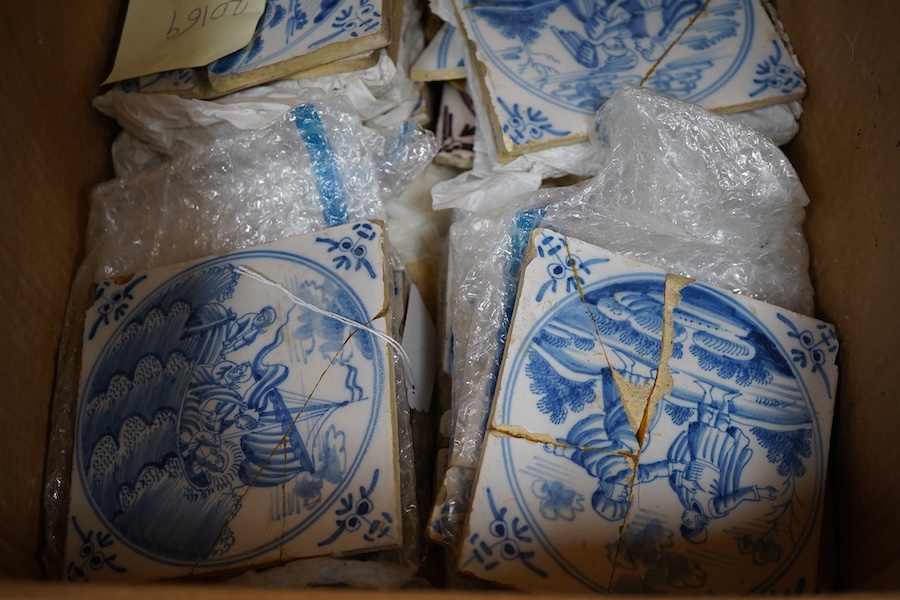 Twenty eight Delft blue and white tiles to include Christ in the Storm of Galilee